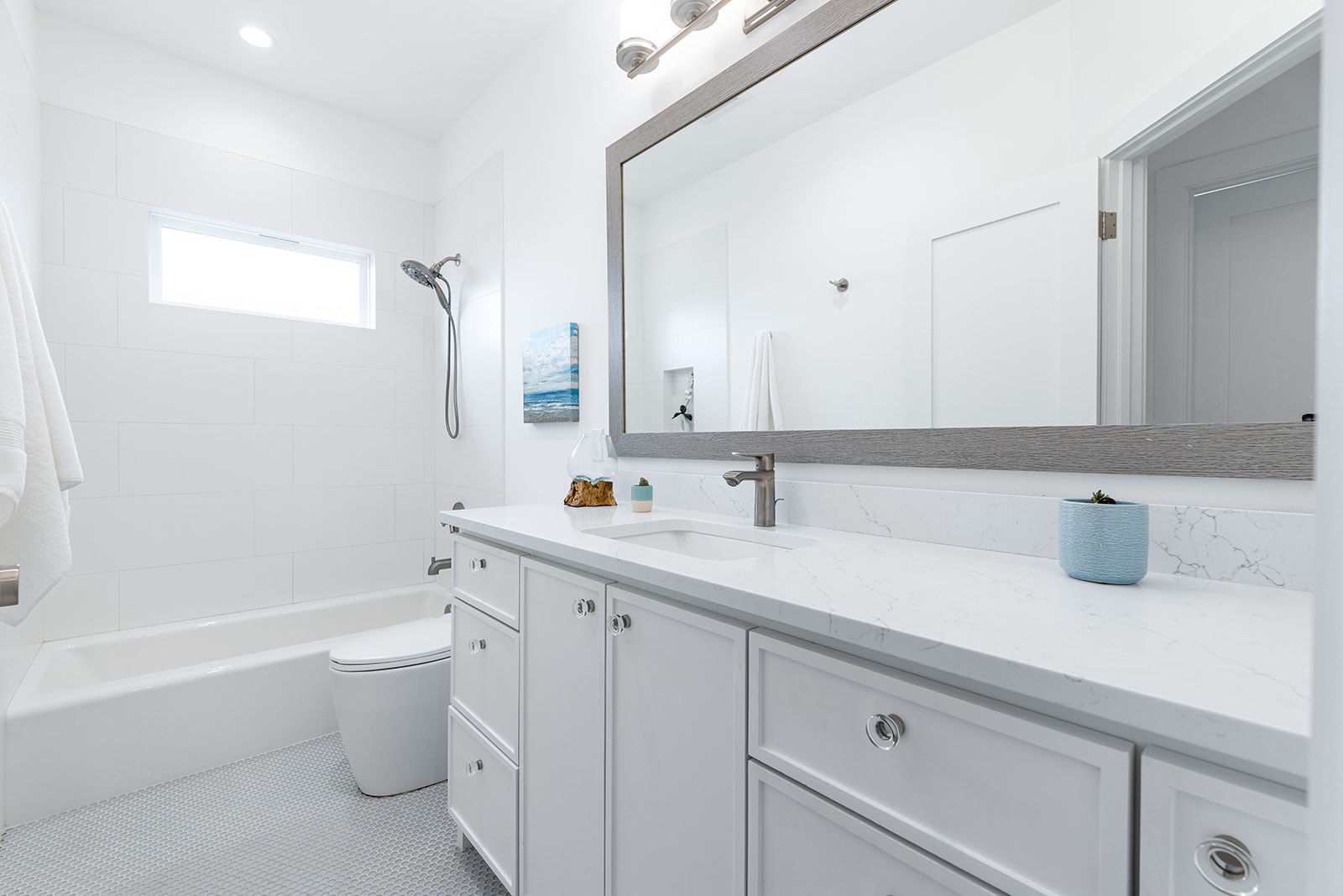 477 Willow Moon Ranch Road Crawford, TX 76638 - Photo 26 of 40 a bathroom with a sink double vanity and toilet