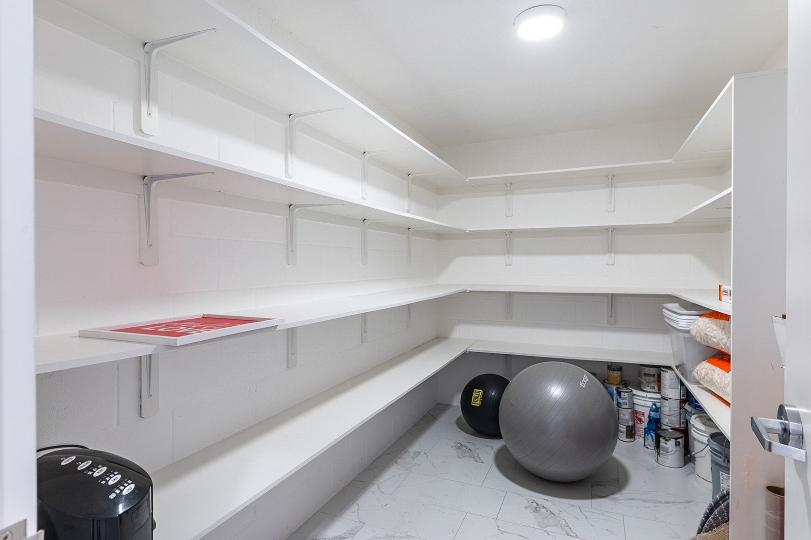477 Willow Moon Ranch Road Crawford, TX 76638 - Photo 29 of 40 a room with storage and utility racks