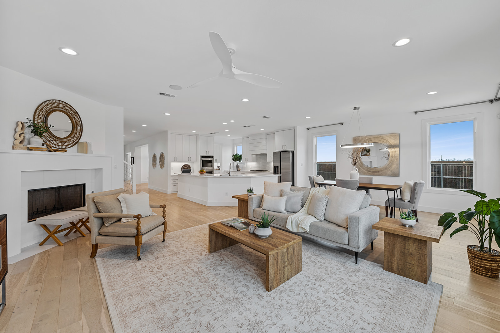 477 Willow Moon Ranch Road Crawford, TX 76638 - Photo 3 of 40 a living room with furniture a fireplace and a table