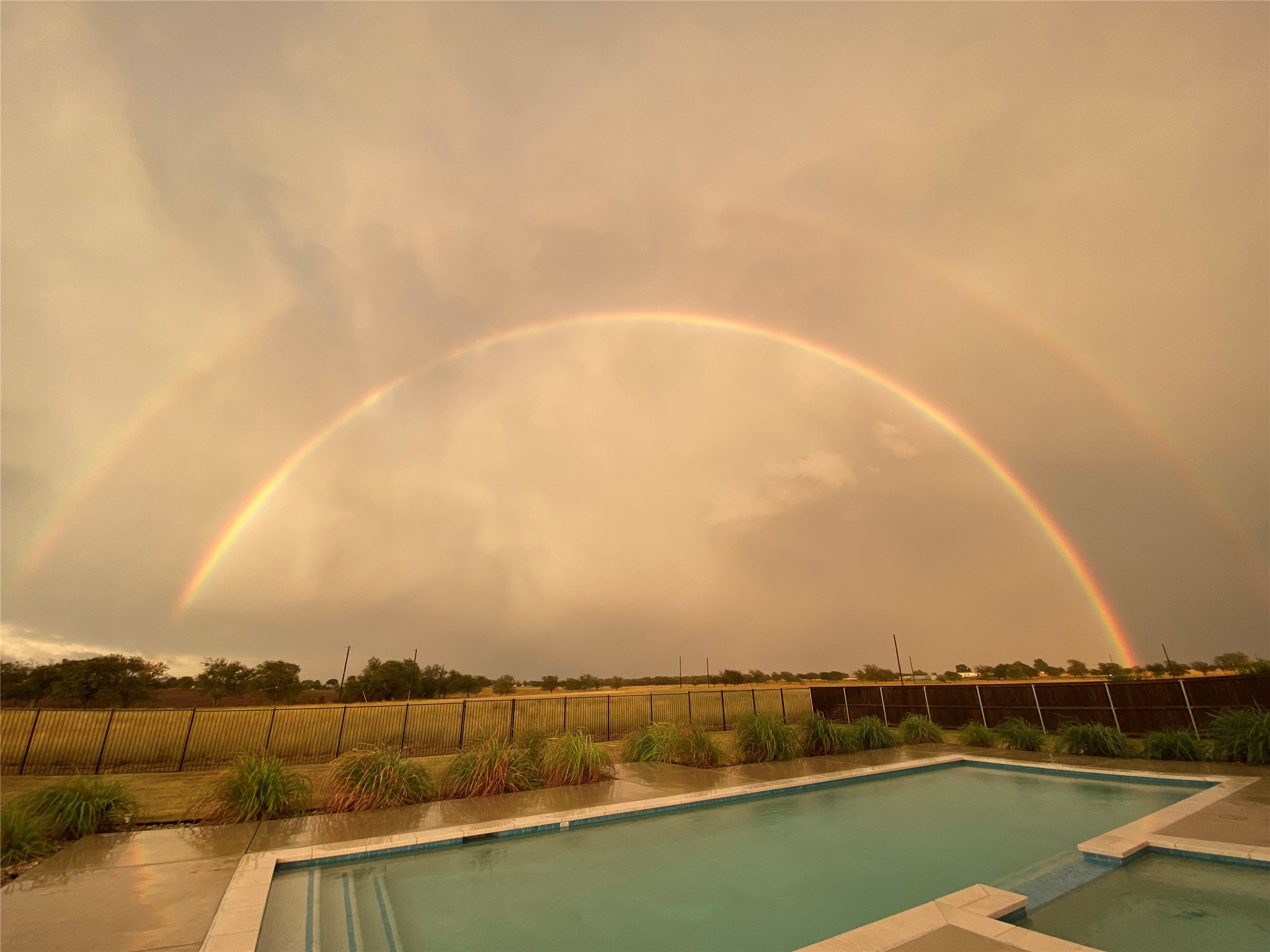 477 Willow Moon Ranch Road Crawford, TX 76638 - Photo 38 of 40 a view of a city with a lake