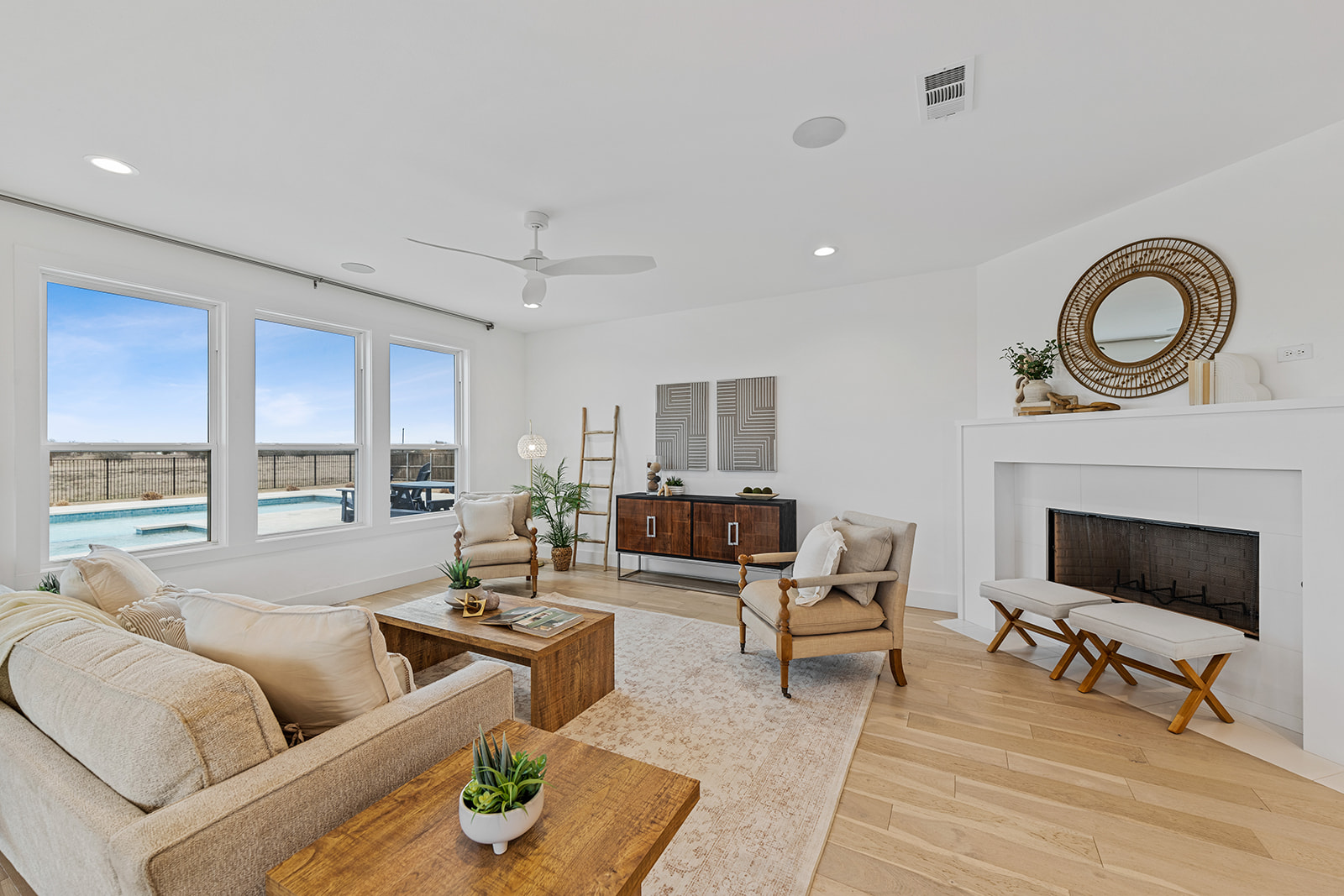 477 Willow Moon Ranch Road Crawford, TX 76638 - Photo 4 of 40 a living room with furniture and a fireplace