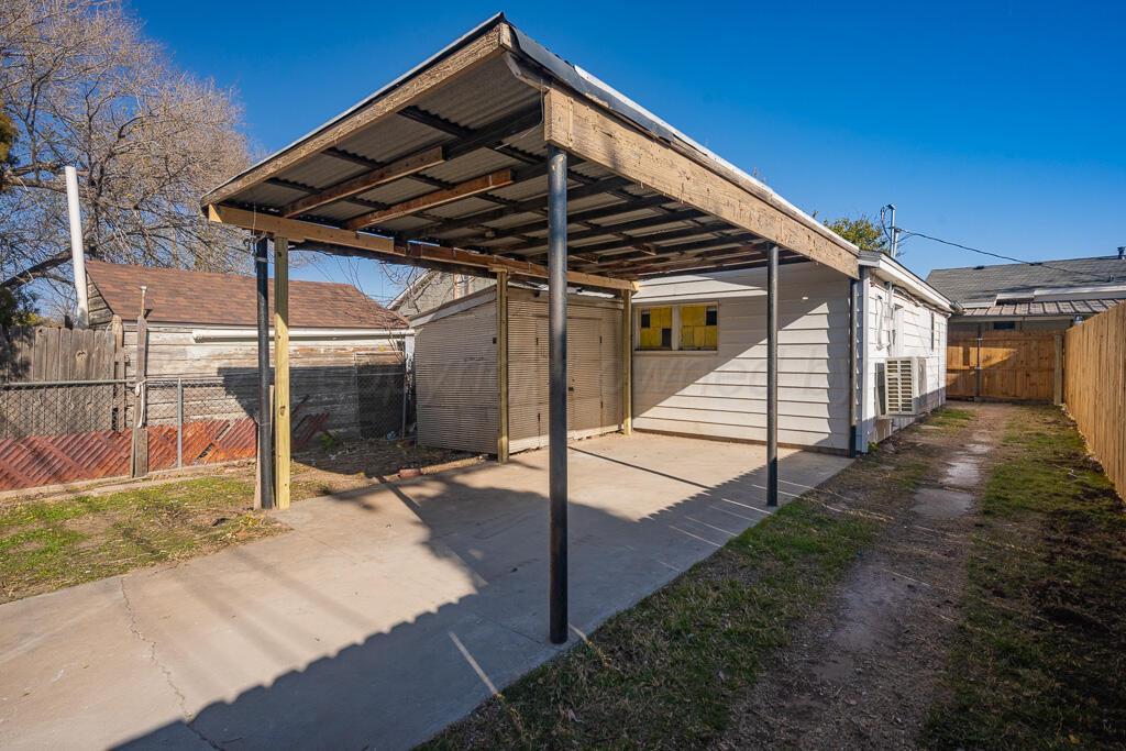 2103 North Marrs Street Amarillo, TX 79107 - Photo 1 of 11 a view of a house with backyard