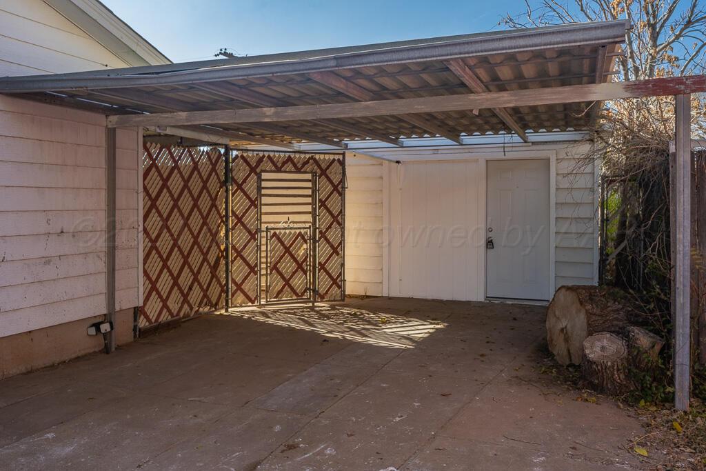 2103 North Marrs Street Amarillo, TX 79107 - Photo 3 of 11 a view of an empty room with a fireplace