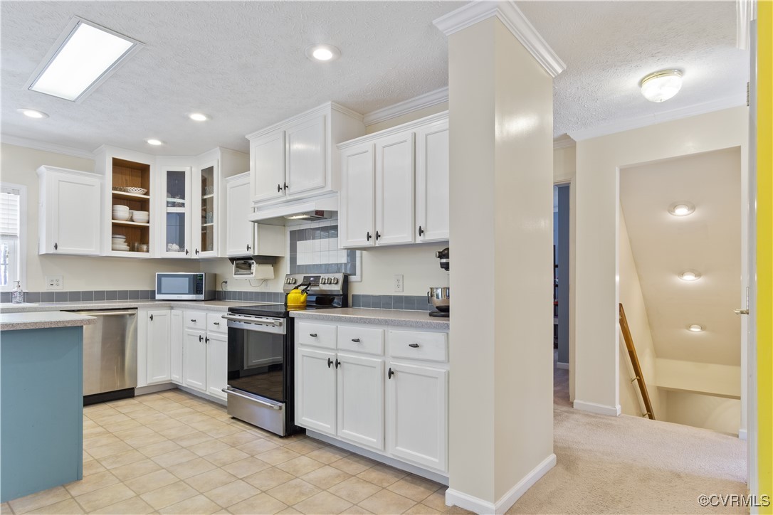 219 Barlow Road Williamsburg, VA 23188 - Photo 17 of 50 a kitchen with stainless steel appliances granite countertop a refrigerator and a sink
