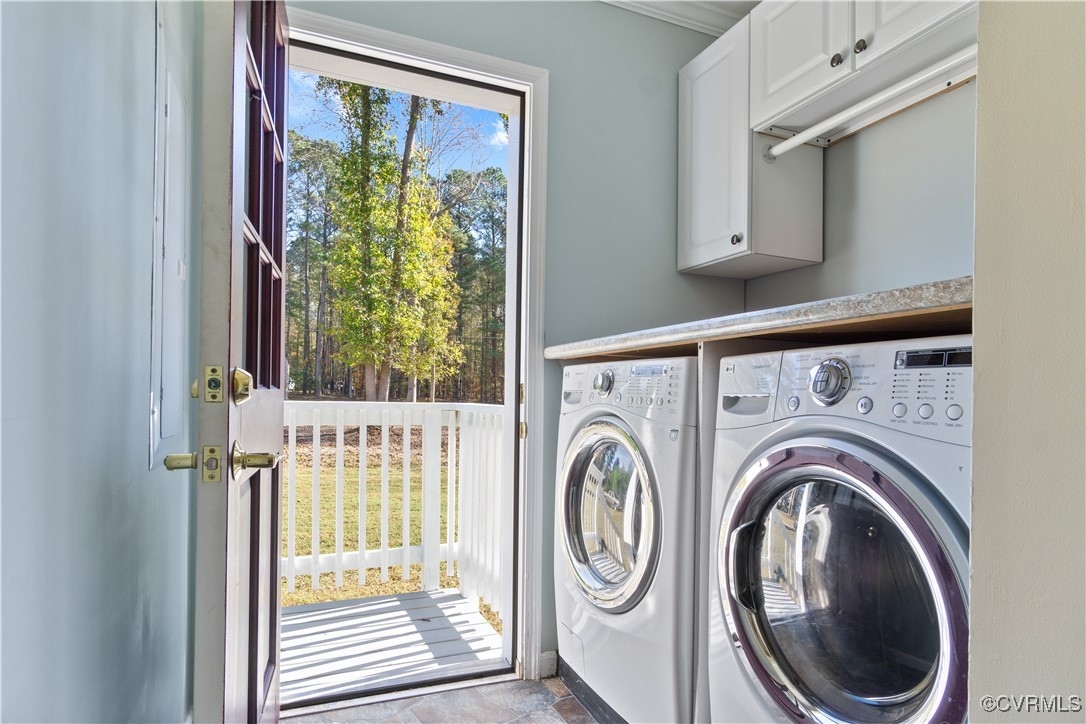 219 Barlow Road Williamsburg, VA 23188 - Photo 30 of 50 a view of a hallway with washer and dryer