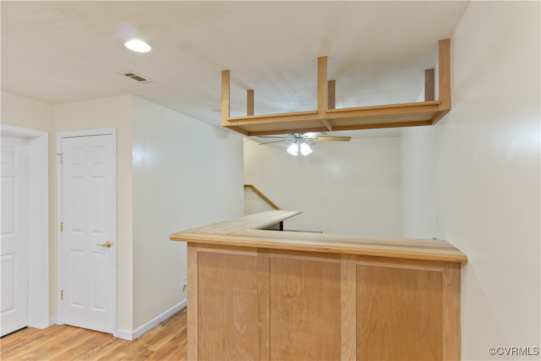 219 Barlow Road Williamsburg, VA 23188 - Photo 33 of 50 a view of a room with rack and wooden floor