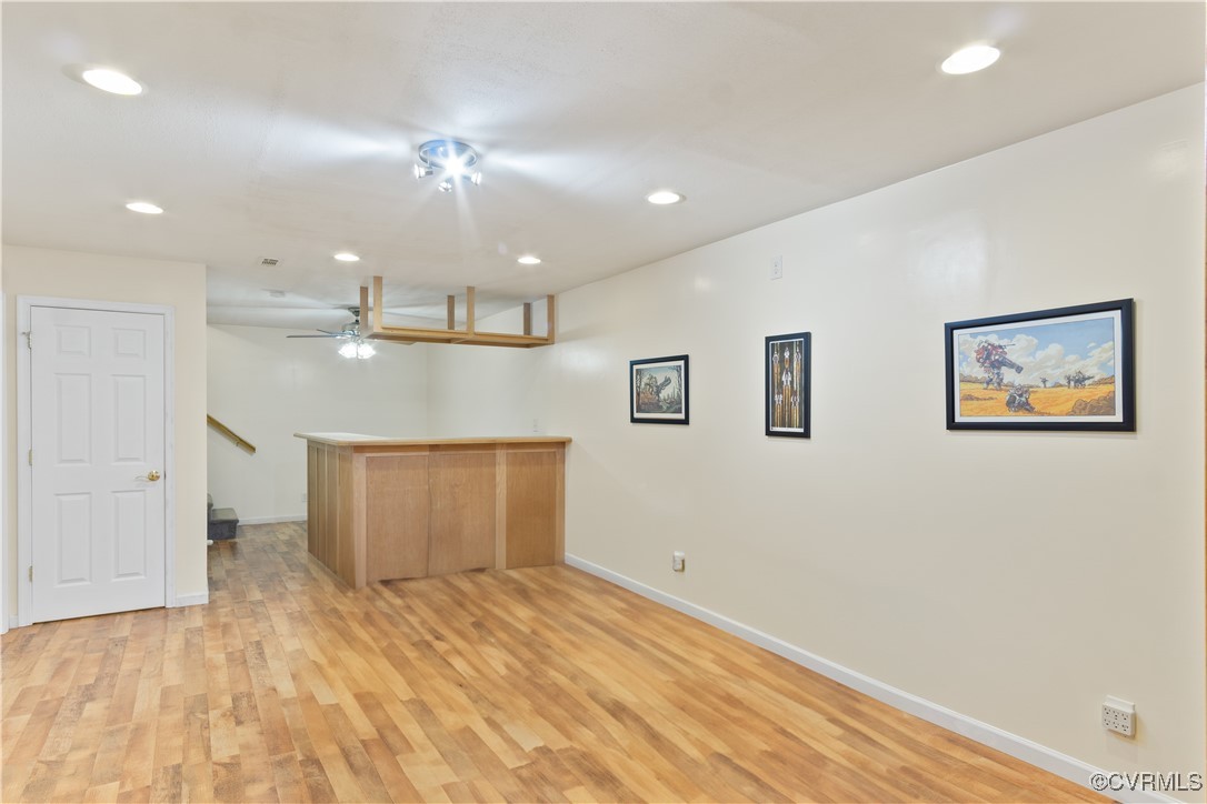 219 Barlow Road Williamsburg, VA 23188 - Photo 34 of 50 a view of a kitchen with a dishwasher cabinets and wooden floor