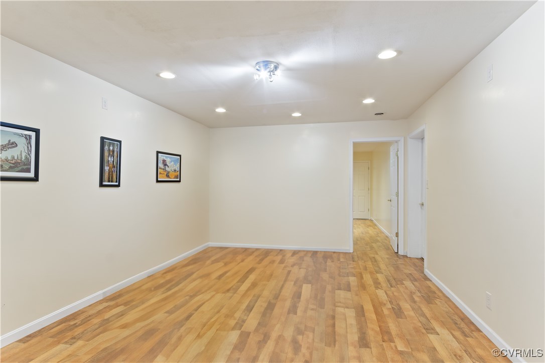 219 Barlow Road Williamsburg, VA 23188 - Photo 37 of 50 a view of empty room with wooden floor