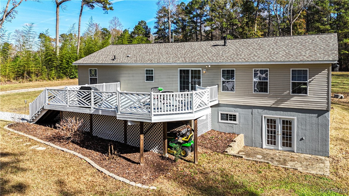 219 Barlow Road Williamsburg, VA 23188 - Photo 46 of 50 a view of a house with a patio and a yard