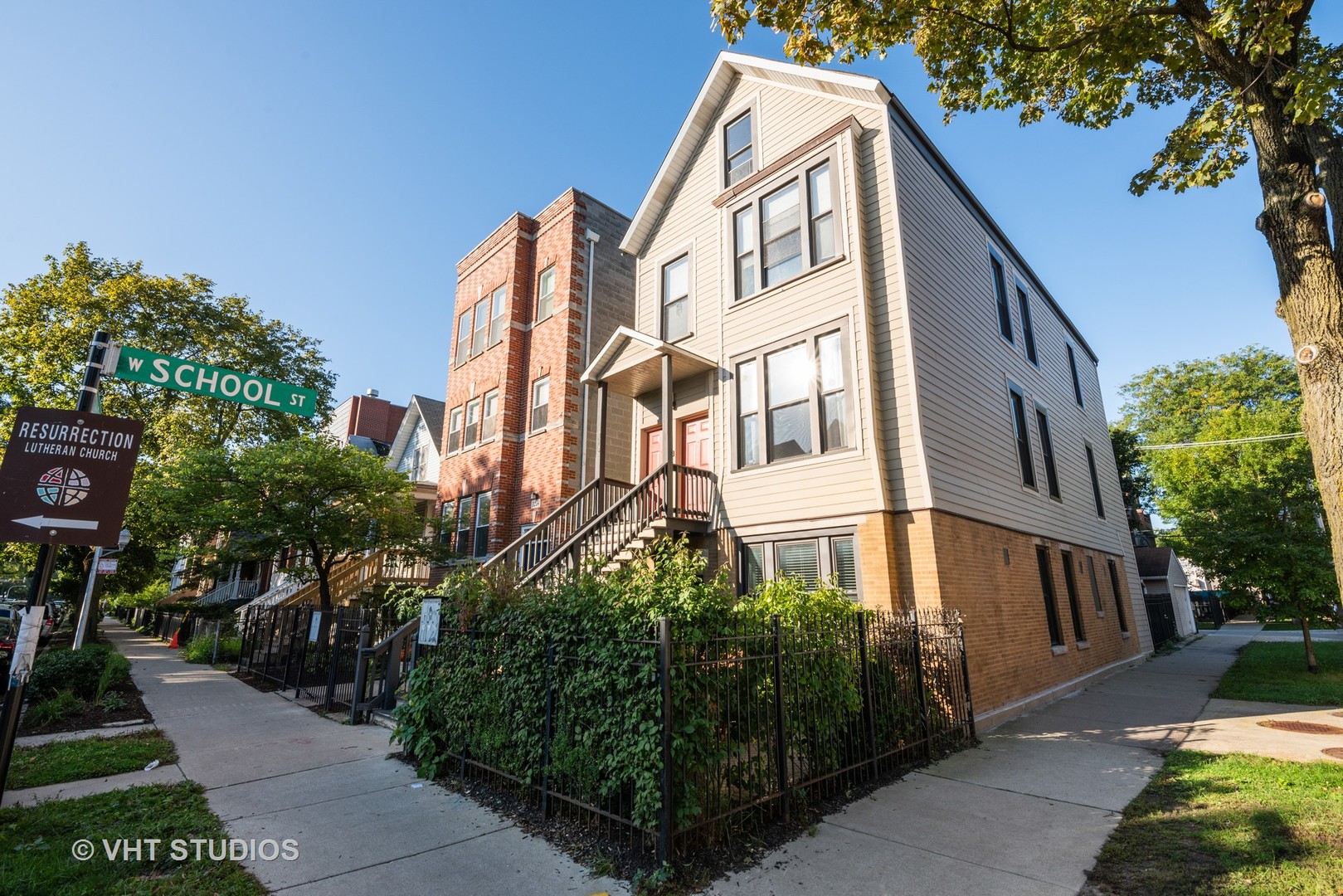 3258 North Racine Avenue, Unit 3 Chicago, IL 60657 - Photo 1 of 19 a view of a house with a yard