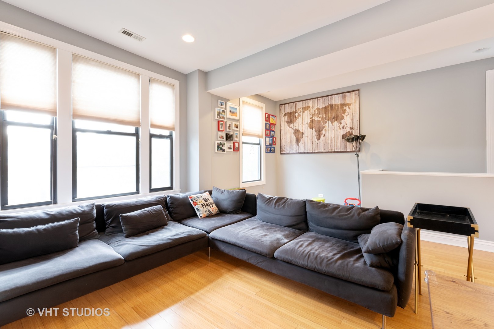 3258 North Racine Avenue, Unit 3 Chicago, IL 60657 - Photo 3 of 19 a living room with furniture and a large window