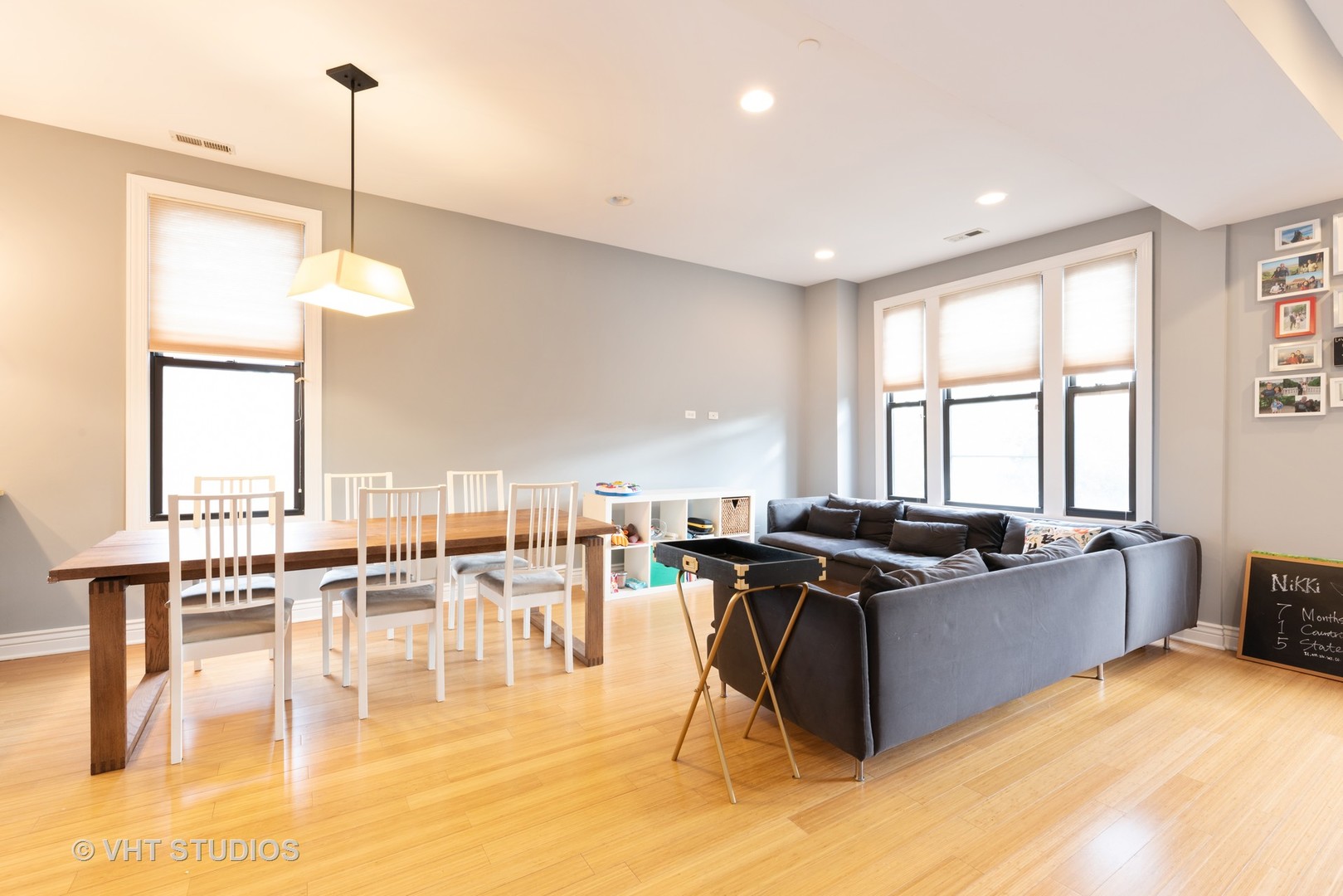 3258 North Racine Avenue, Unit 3 Chicago, IL 60657 - Photo 4 of 19 a view of a dining room with furniture window and outside view