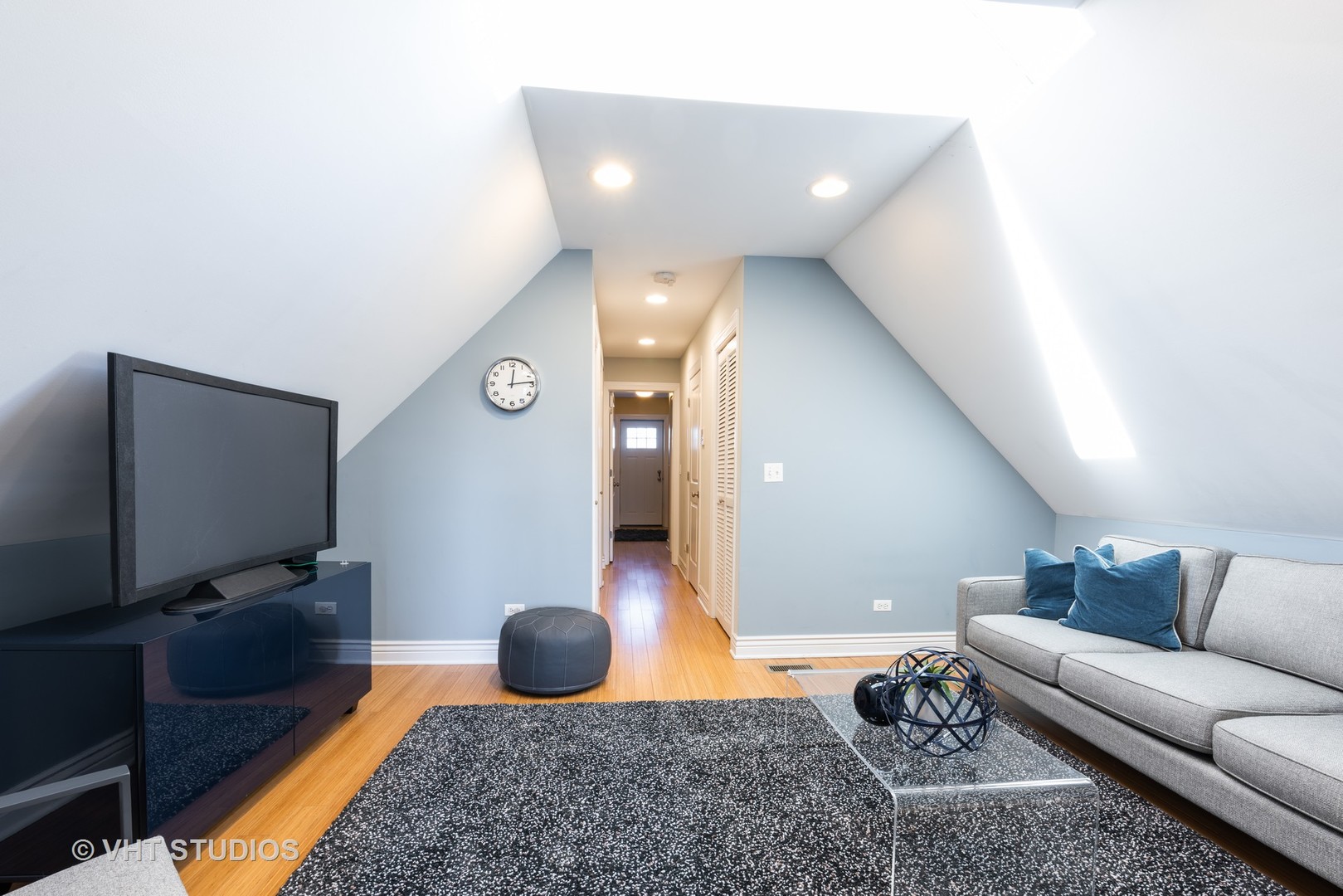 3258 North Racine Avenue, Unit 3 Chicago, IL 60657 - Photo 7 of 19 a living room with furniture and a flat screen tv
