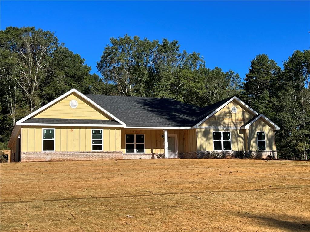 7025 Jefferson Road Commerce, GA 30529 - Photo 1 of 1 a front view of a house with a yard