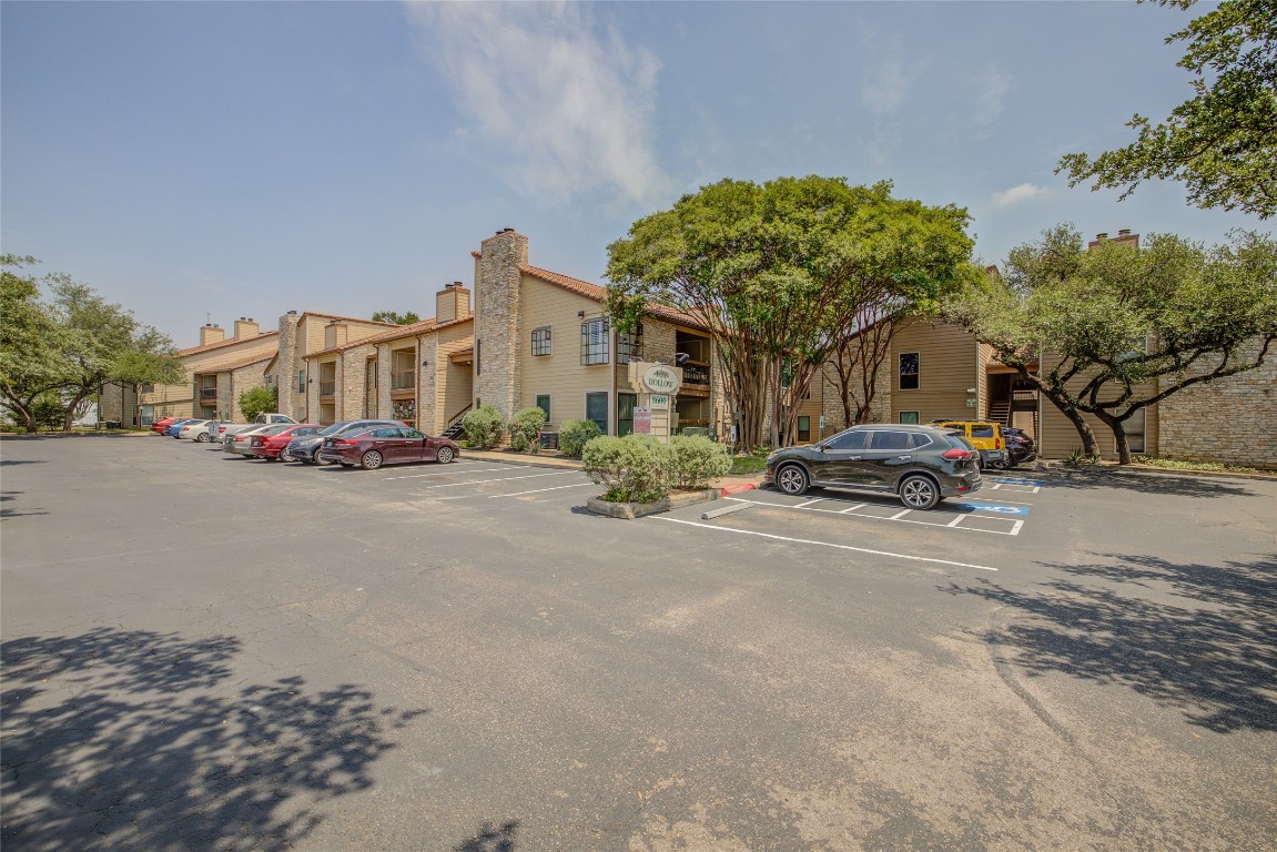 8600 Fathom Circle, Unit 1303 Austin, TX 78750 - Photo 2 of 30 a view of street with parked cars