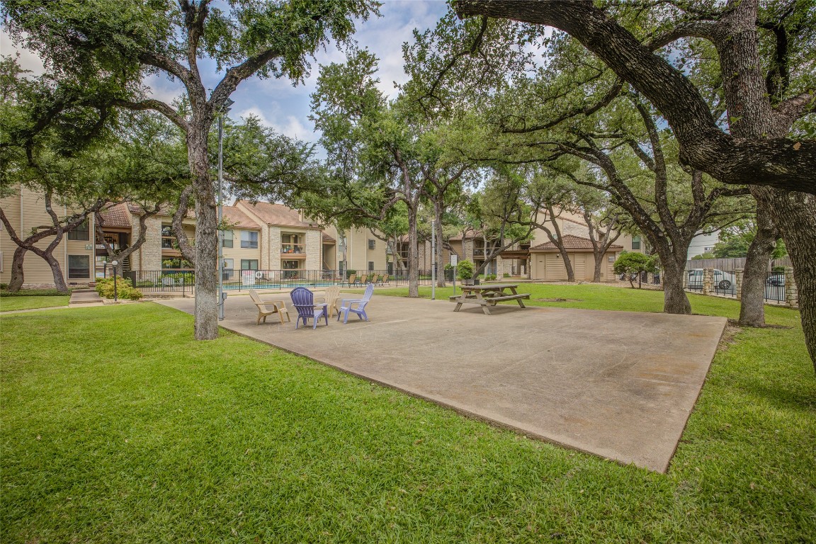 8600 Fathom Circle, Unit 1303 Austin, TX 78750 - Photo 28 of 30 a view of outdoor space with garden and trees