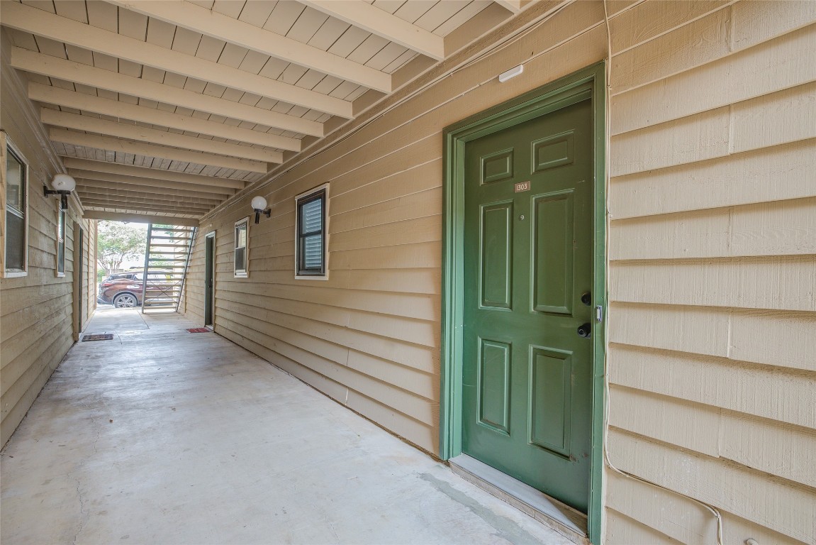 8600 Fathom Circle, Unit 1303 Austin, TX 78750 - Photo 3 of 30 a view of front door of a house