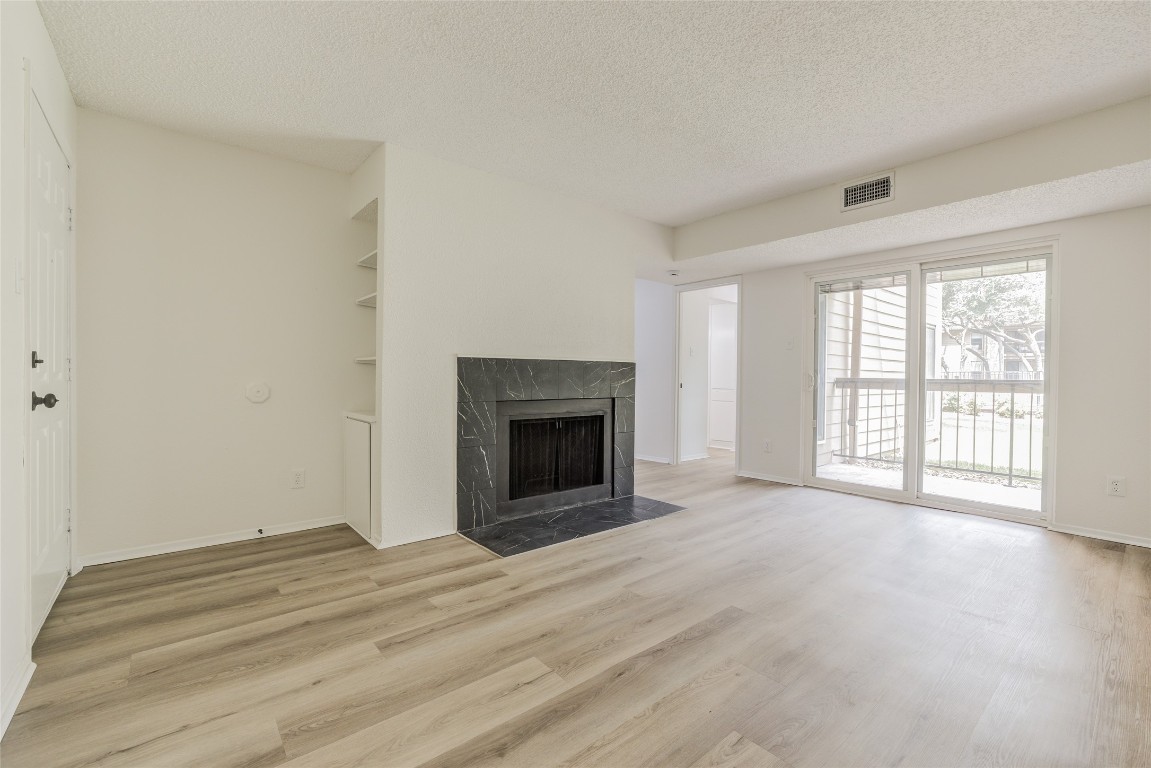 8600 Fathom Circle, Unit 1303 Austin, TX 78750 - Photo 6 of 30 a view of an empty room with a window
