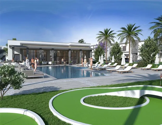 a view of a swimming pool with an outdoor seating