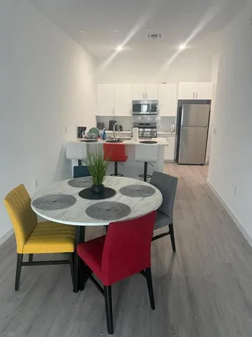 a view of a dining room with furniture