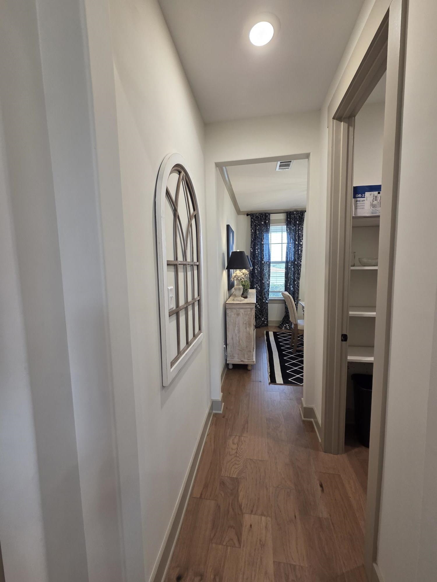 657 Mount Laurel Drive Collierville, TN 38017 - Photo 12 of 40 a view of entryway and hall with wooden floor