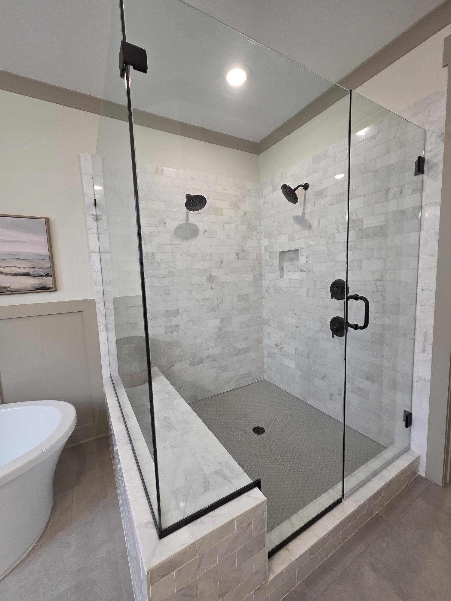 657 Mount Laurel Drive Collierville, TN 38017 - Photo 20 of 40 a bathroom with a shower and a toilet