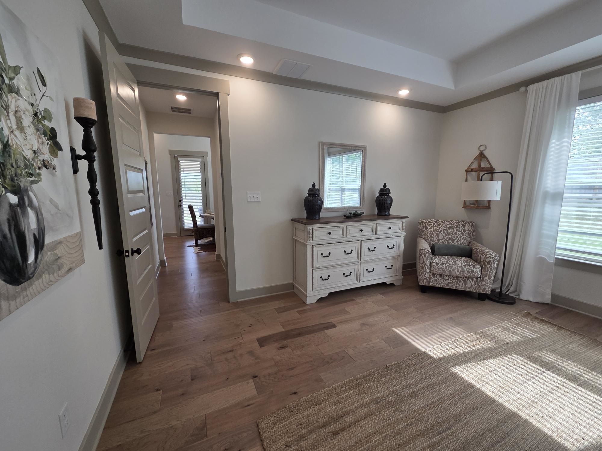 657 Mount Laurel Drive Collierville, TN 38017 - Photo 24 of 40 a view of a bedroom with furniture and window