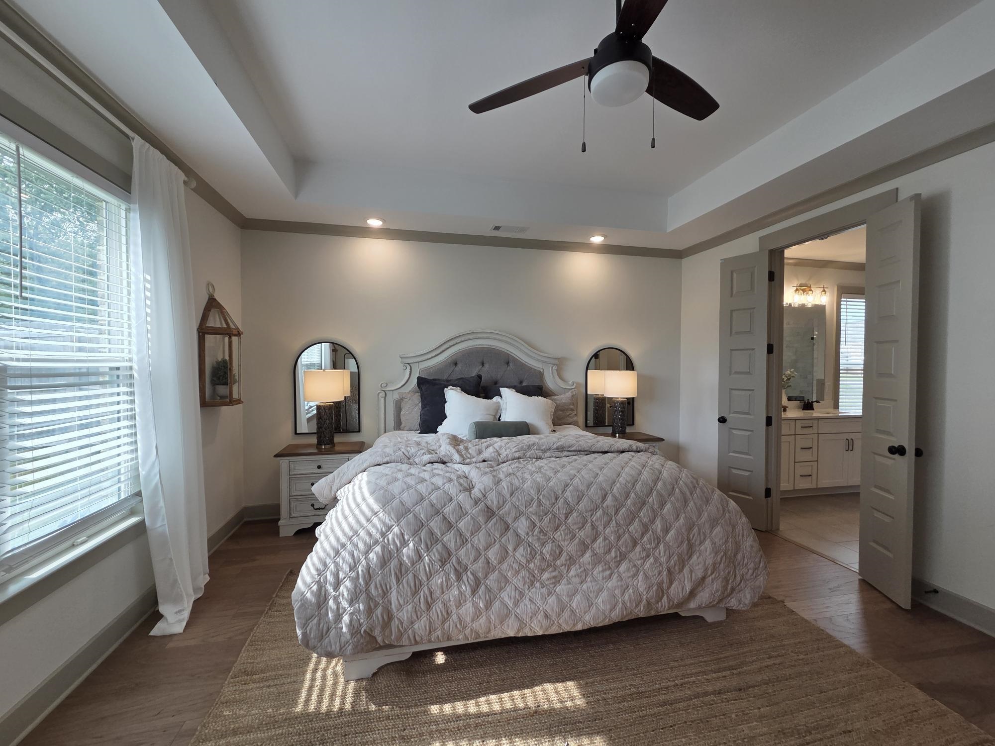 657 Mount Laurel Drive Collierville, TN 38017 - Photo 25 of 40 a bedroom with a bed and window