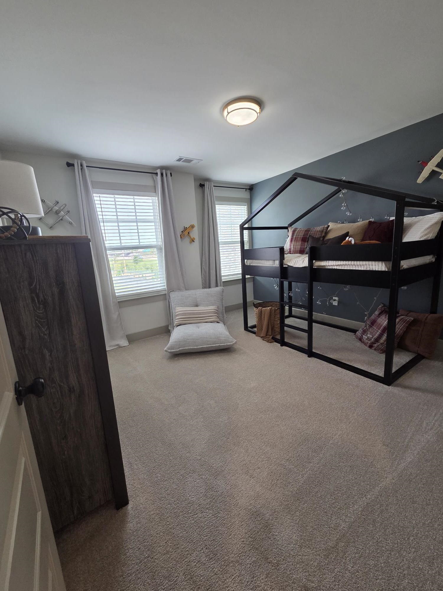 657 Mount Laurel Drive Collierville, TN 38017 - Photo 32 of 40 a bedroom with furniture and a window
