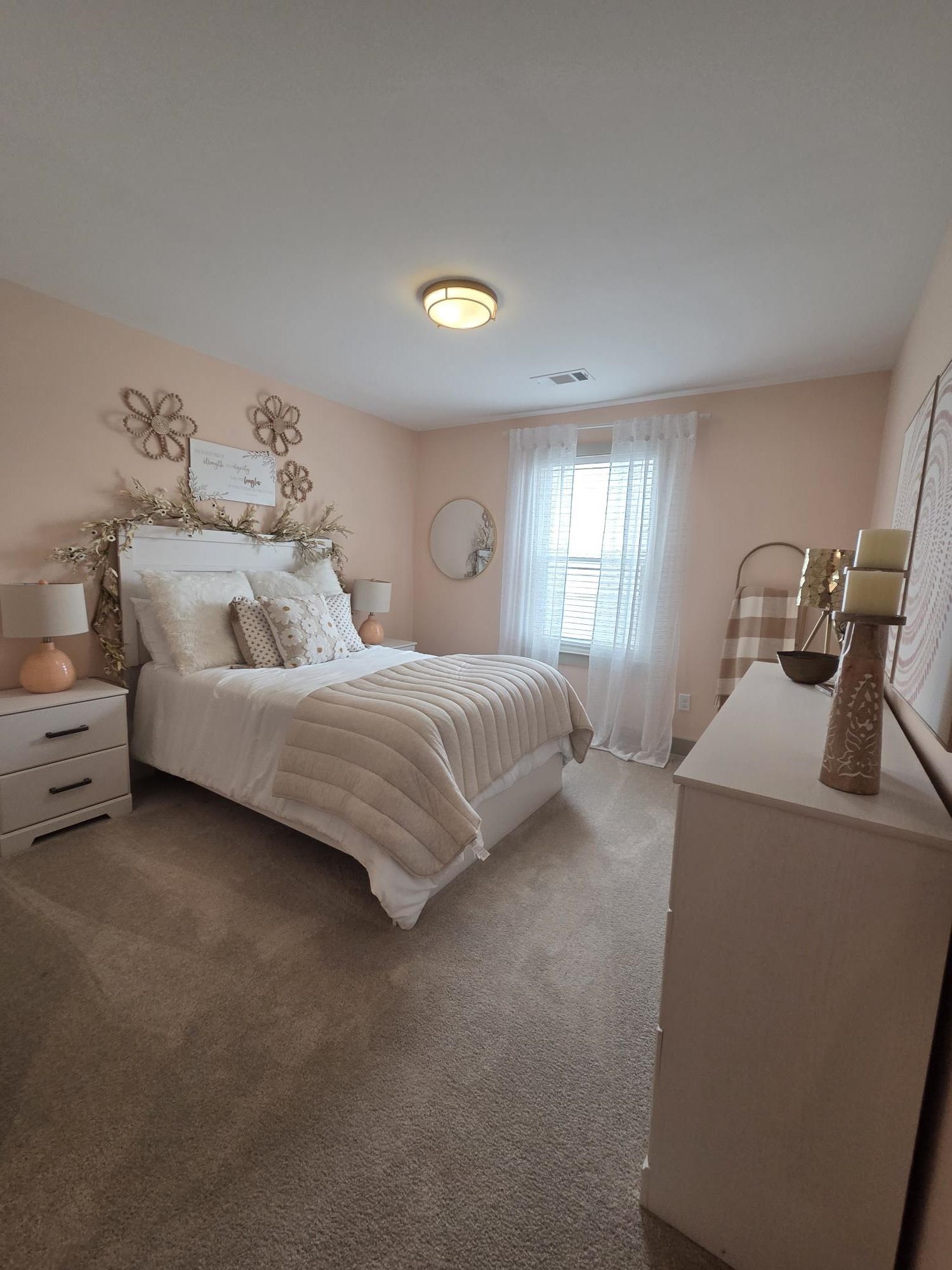 657 Mount Laurel Drive Collierville, TN 38017 - Photo 39 of 40 a bedroom with bed and window