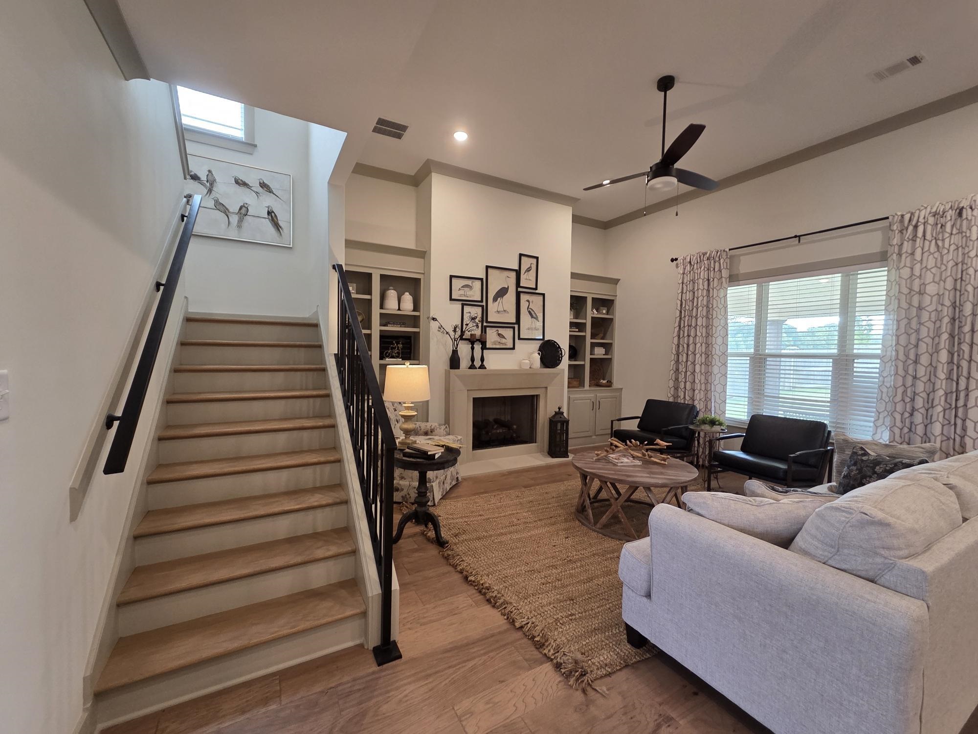 657 Mount Laurel Drive Collierville, TN 38017 - Photo 5 of 40 a living room with furniture and a fireplace