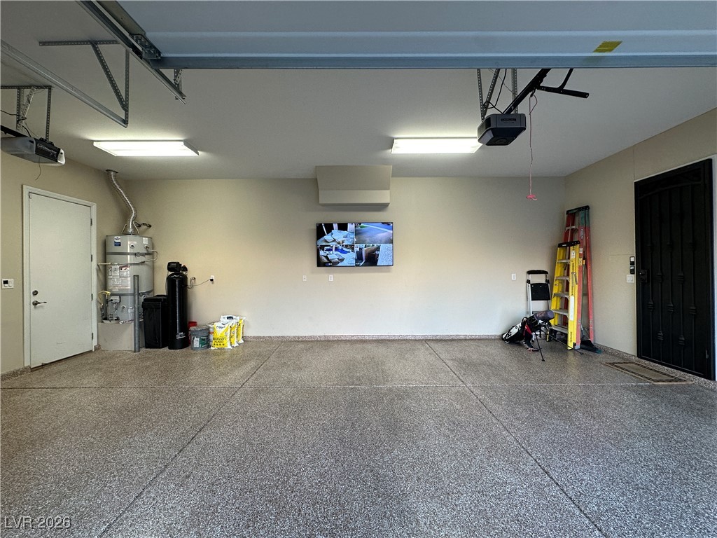 309 Goldstar Street Henderson, NV 89012 - Photo 45 of 46 Epoxy floors, water conditioner, security door to house.