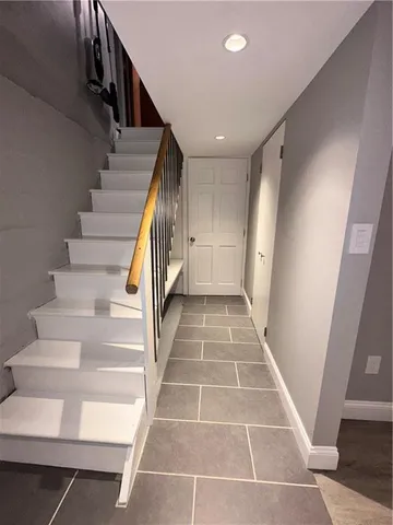 a view of staircase with white walls and white walls