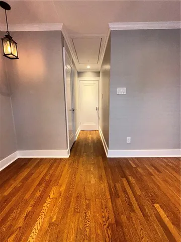a view of a livingroom with wooden floor