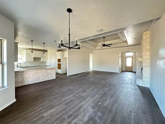 a view of a kitchen with a sink and dishwasher