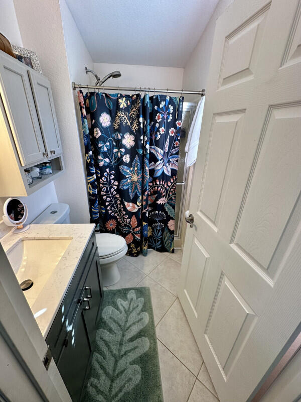 1109 76 Street, Unit OCEAN Marathon, FL 33050 - Photo 11 of 24 a bathroom with a sink toilet and shower