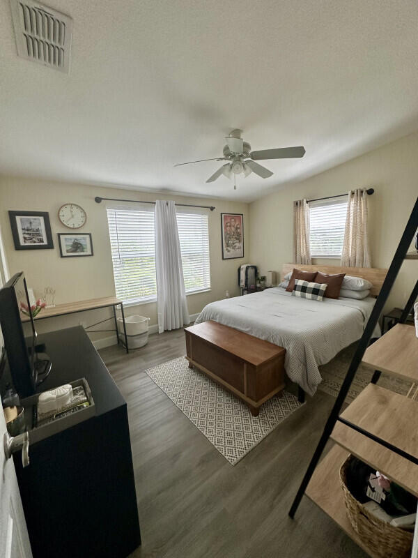 1109 76 Street, Unit OCEAN Marathon, FL 33050 - Photo 15 of 24 a bedroom with double bed and a window