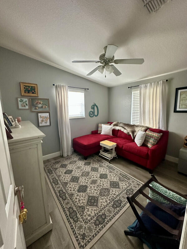 1109 76 Street, Unit OCEAN Marathon, FL 33050 - Photo 17 of 24 a living room with furniture rug and window