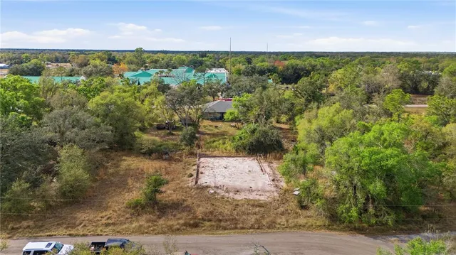 a view of a yard with an outdoor space
