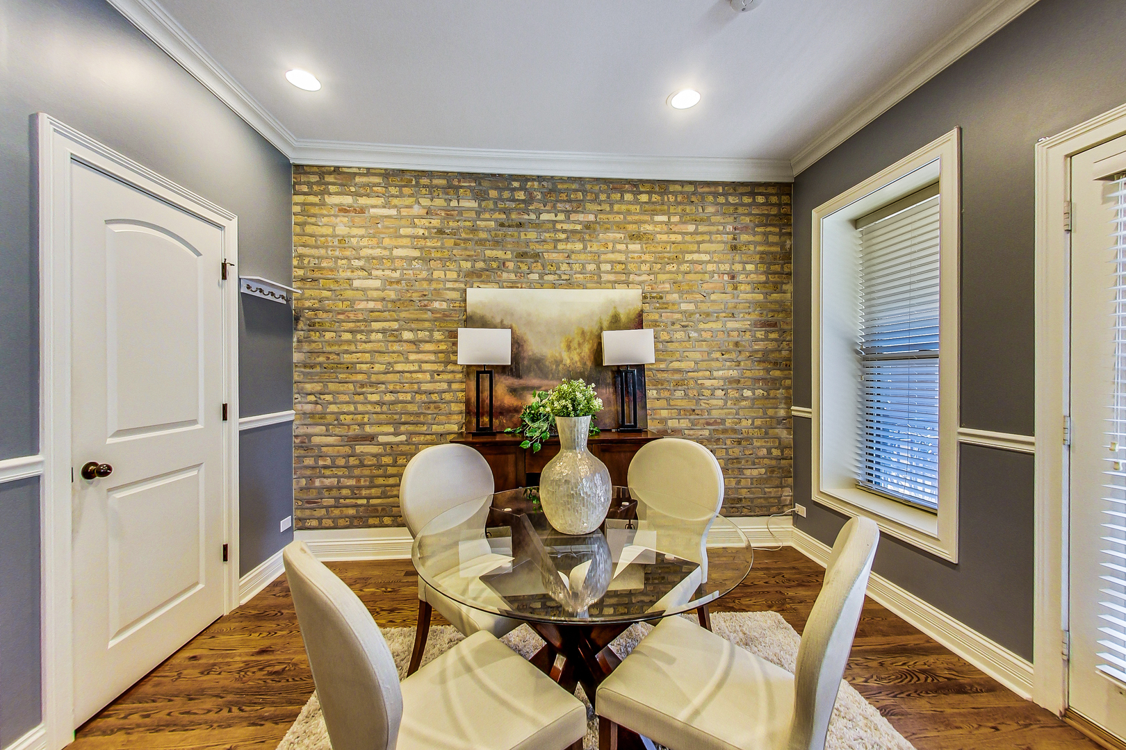 5219 North Winthrop Avenue, Unit 2N Chicago, IL 60640 - Photo 11 of 32 a very nice looking dining room with furniture and a large window