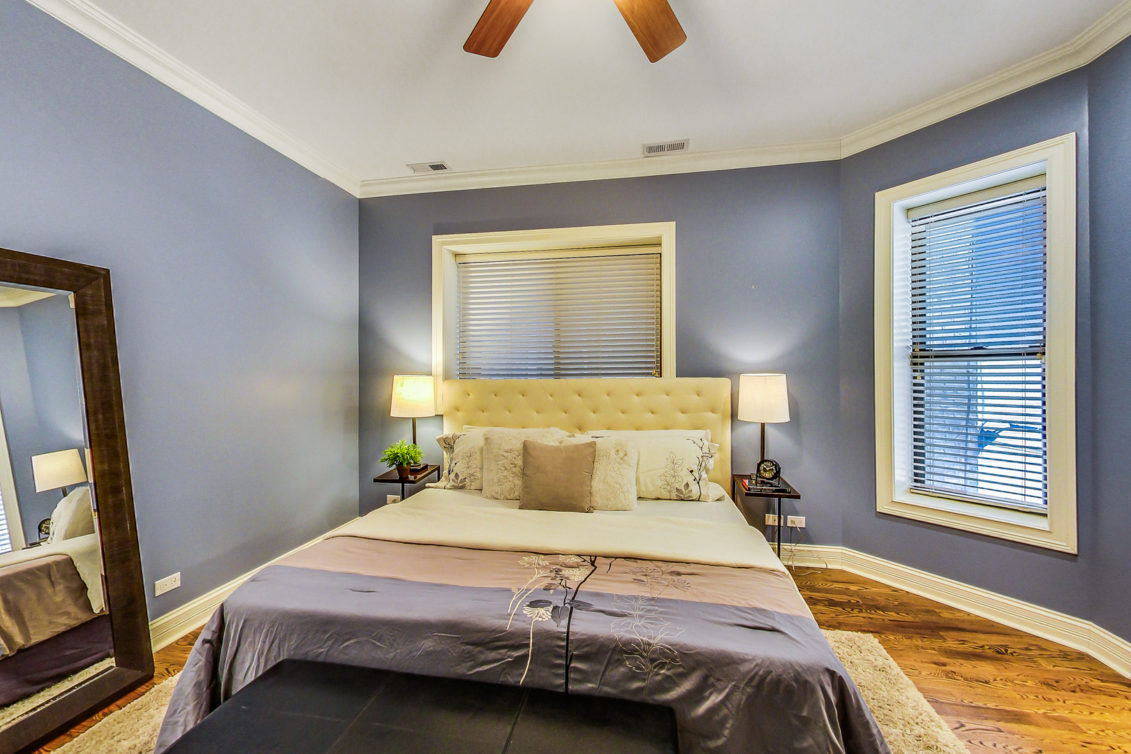 5219 North Winthrop Avenue, Unit 2N Chicago, IL 60640 - Photo 18 of 32 a bedroom with a bed and wooden floor