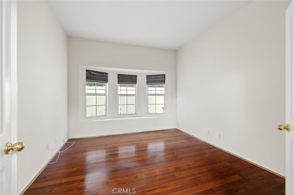 33686 Bridgehampton Drive Dana Point, CA 92629 - Photo 13 of 29 an empty room with wooden floor and window