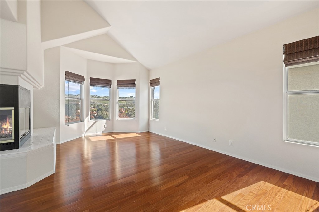 33686 Bridgehampton Drive Dana Point, CA 92629 - Photo 20 of 29 an empty room with wooden floor and windows