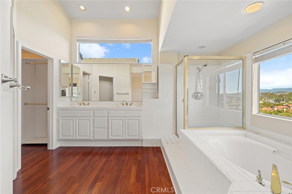 33686 Bridgehampton Drive Dana Point, CA 92629 - Photo 22 of 29 a bathroom with a tub shower and sink