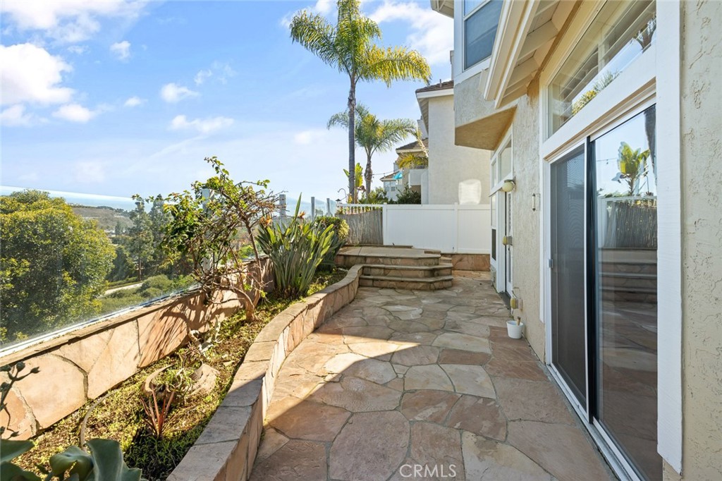 33686 Bridgehampton Drive Dana Point, CA 92629 - Photo 28 of 29 a view of a pathway both side of house