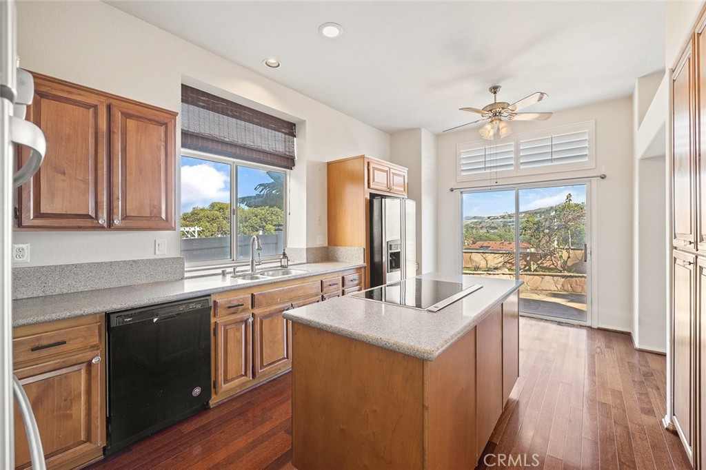 33686 Bridgehampton Drive Dana Point, CA 92629 - Photo 7 of 29 a kitchen with sink stove and refrigerator