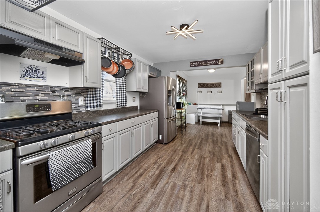 3301 Wildwood Road Middletown, OH 45042 - Photo 11 of 68 This spacious kitchen offers a blend of modern appliances and functional design, perfect for culinary endeavors.
