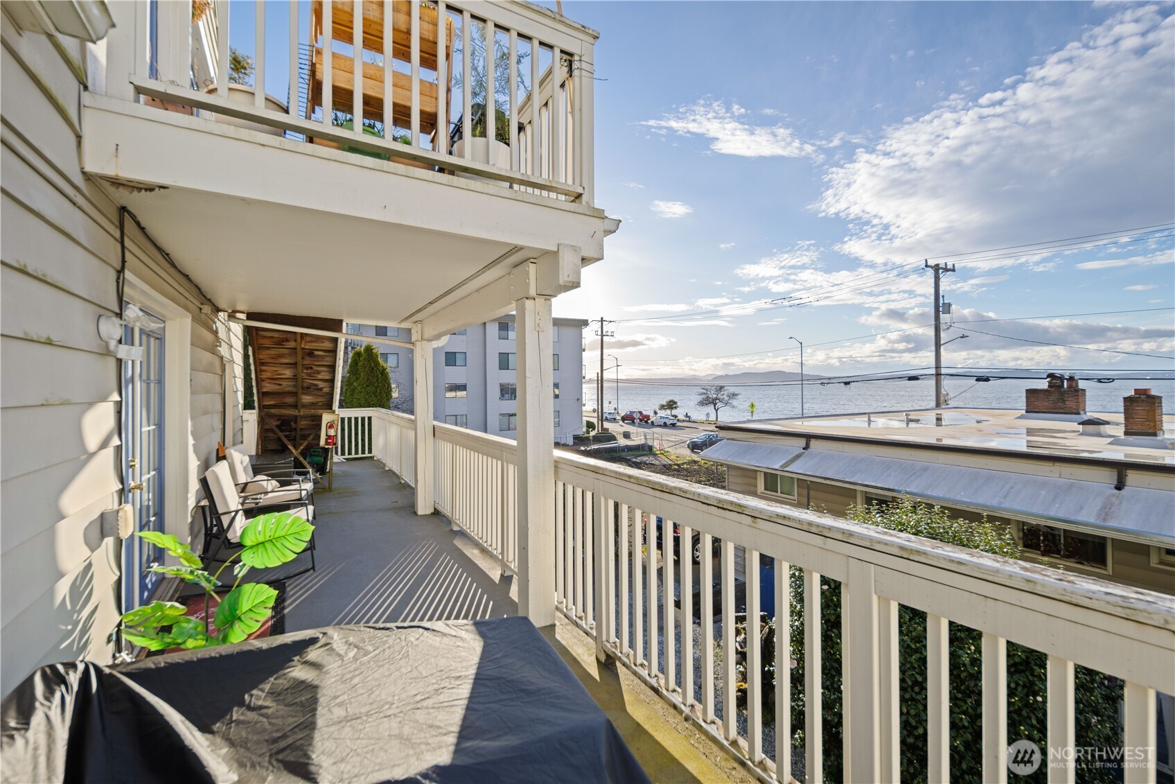 1788 Alki Avenue Southwest Seattle, WA 98116 - Photo 12 of 38 a view of a balcony with chairs