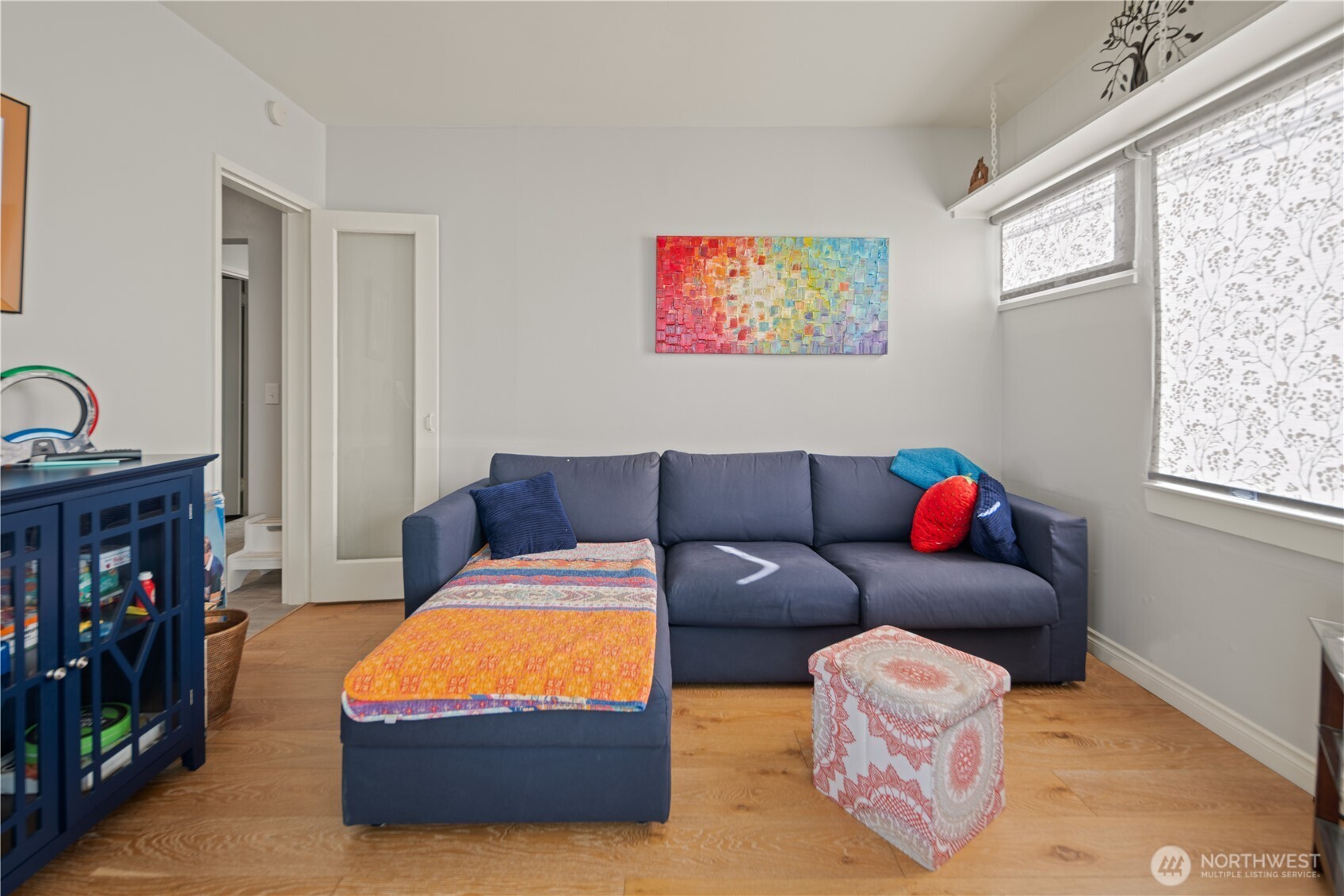 1788 Alki Avenue Southwest Seattle, WA 98116 - Photo 18 of 38 a living room with furniture and a flat screen tv