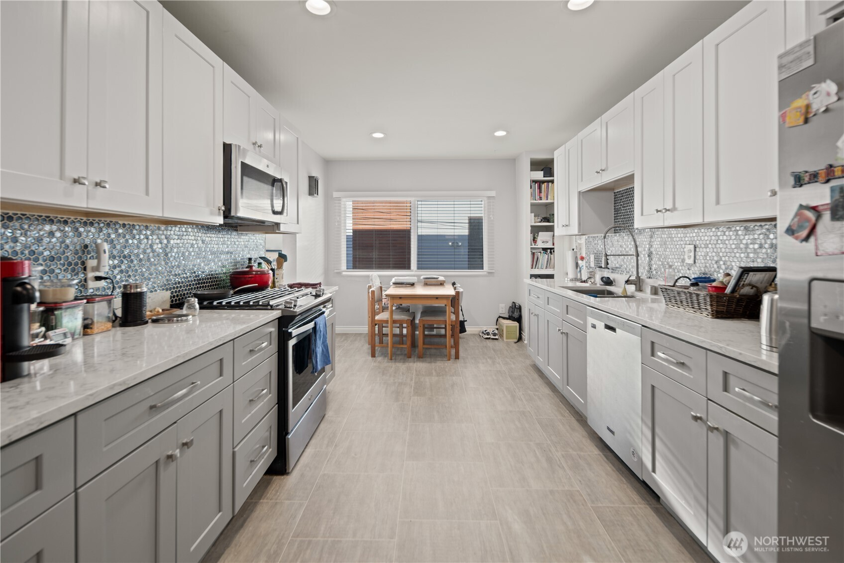1788 Alki Avenue Southwest Seattle, WA 98116 - Photo 19 of 38 a kitchen with cabinets a sink and appliances